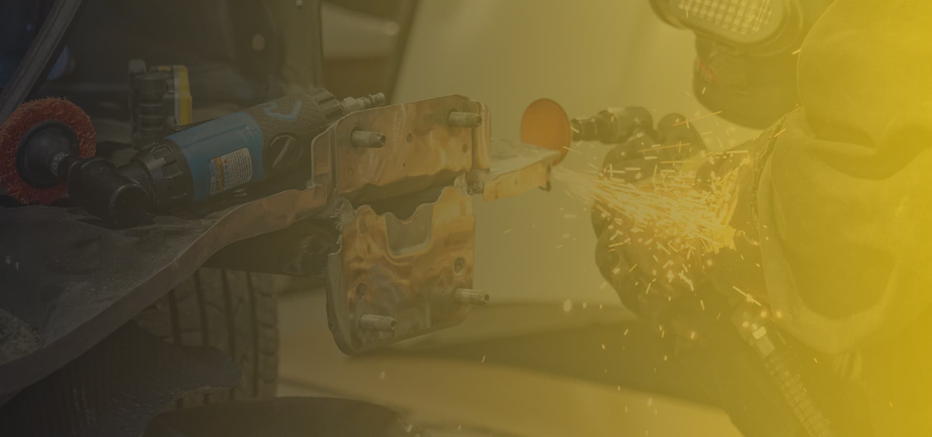 Hero image showing a car being repaired